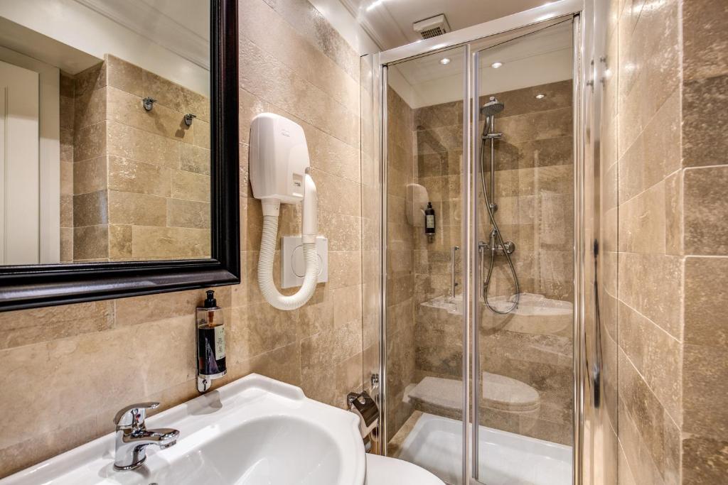Koupelna v ubytování Hotel dei Quiriti Suite