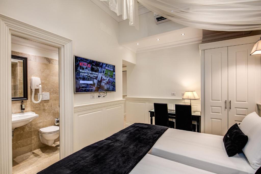 Koupelna v ubytování Hotel dei Quiriti Suite