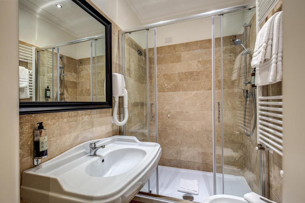 Koupelna v ubytování Hotel dei Quiriti Suite