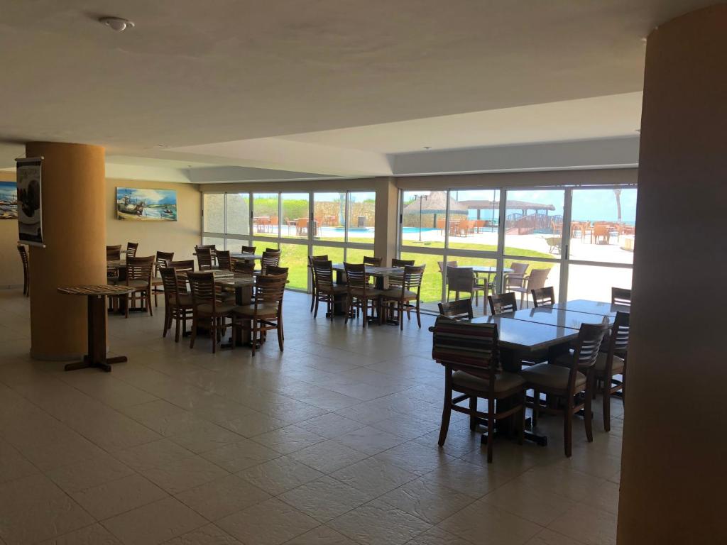  MARUPIARA SUITES- FLAT MURO ALTO
