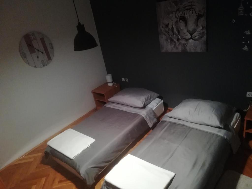 Postel nebo postele na pokoji v ubytování Apartmani Marin