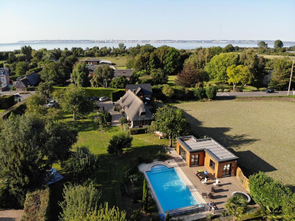 an aerial view of a house with a swimming pool at La Griotte & Spa&Piscine in Pennedepie