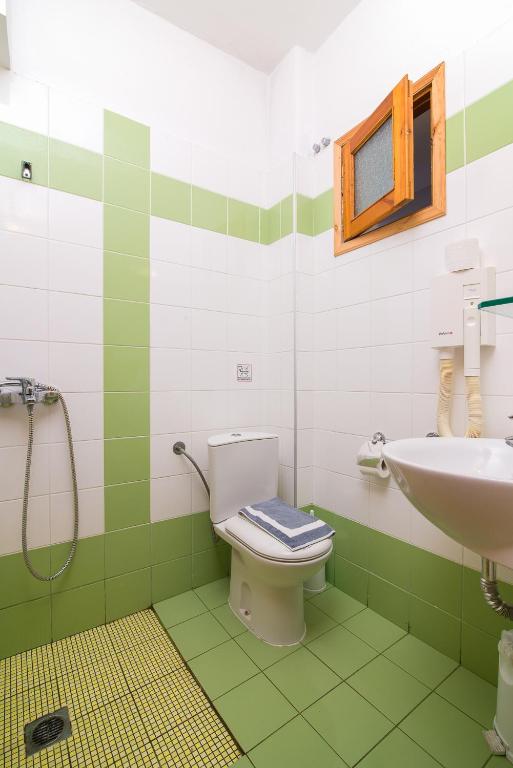 Koupelna v ubytování Hotel Calypso