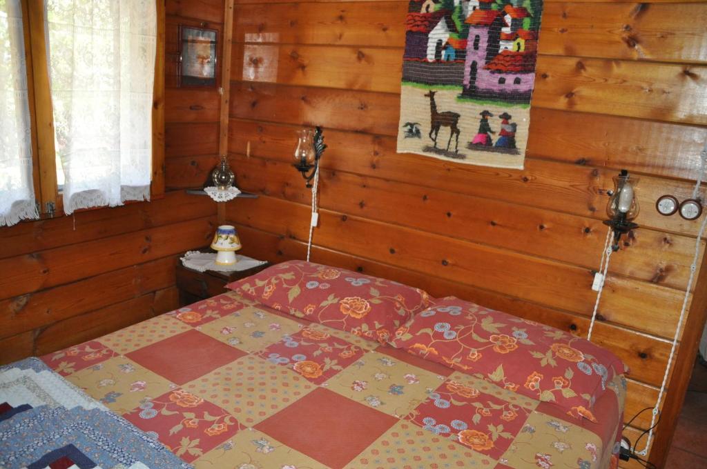 Postel nebo postele na pokoji v ubytování Etna Baite Milo