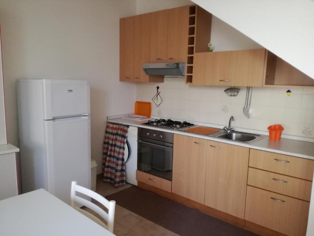 Kuchyň nebo kuchyňský kout v ubytování Casa Gialla