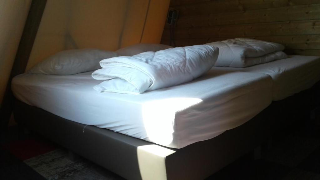 Postel nebo postele na pokoji v ubytování Boerderij Halfweg
