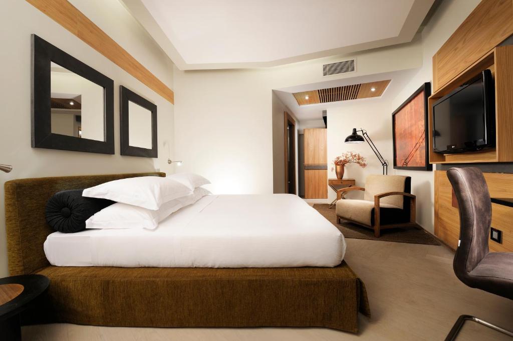 A bed or beds in a room at Babuino 181 - Small Luxury Hotels of the World