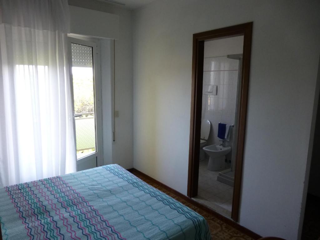 Postel nebo postele na pokoji v ubytování Hotel Sole