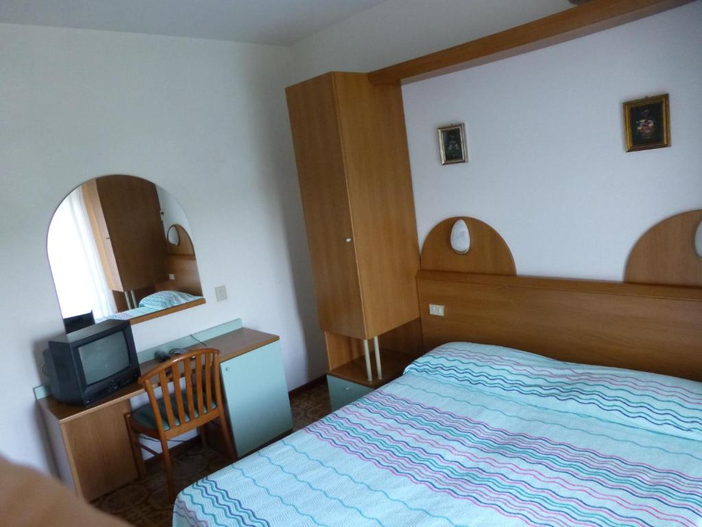 Postel nebo postele na pokoji v ubytování Hotel Sole