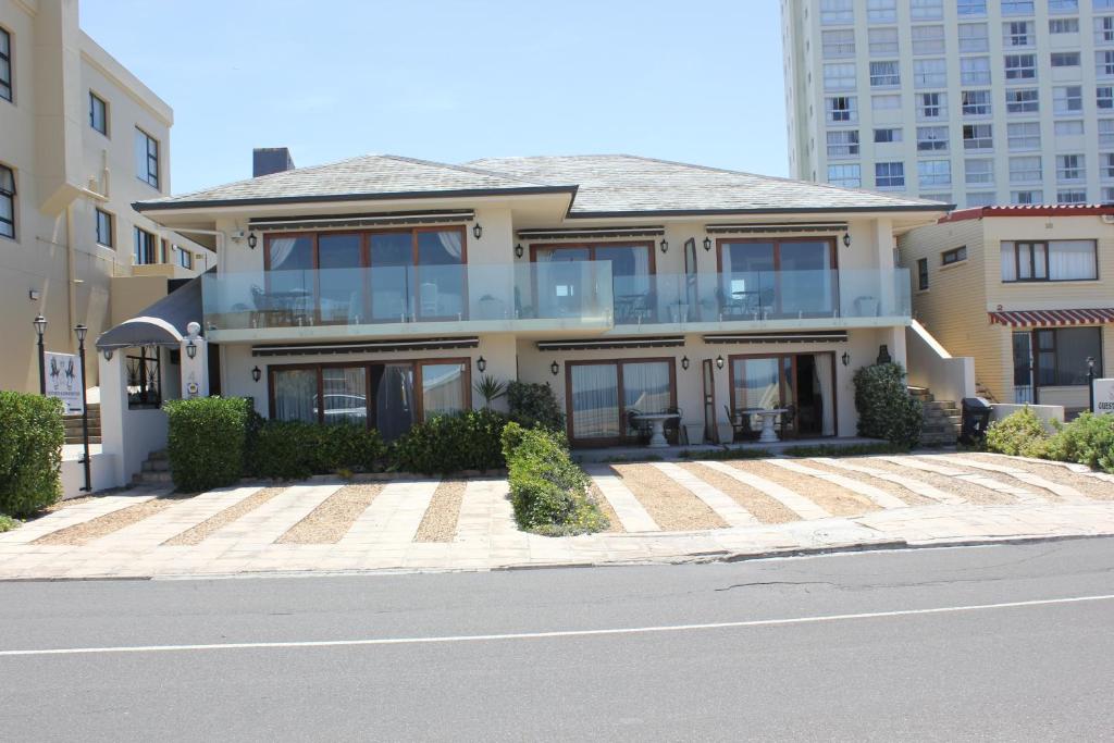 a house on the side of a city street at Mt Bijoux Preferred Accommodation in Bloubergstrand