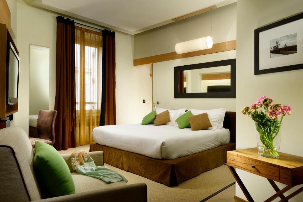 A bed or beds in a room at Babuino 181 - Small Luxury Hotels of the World