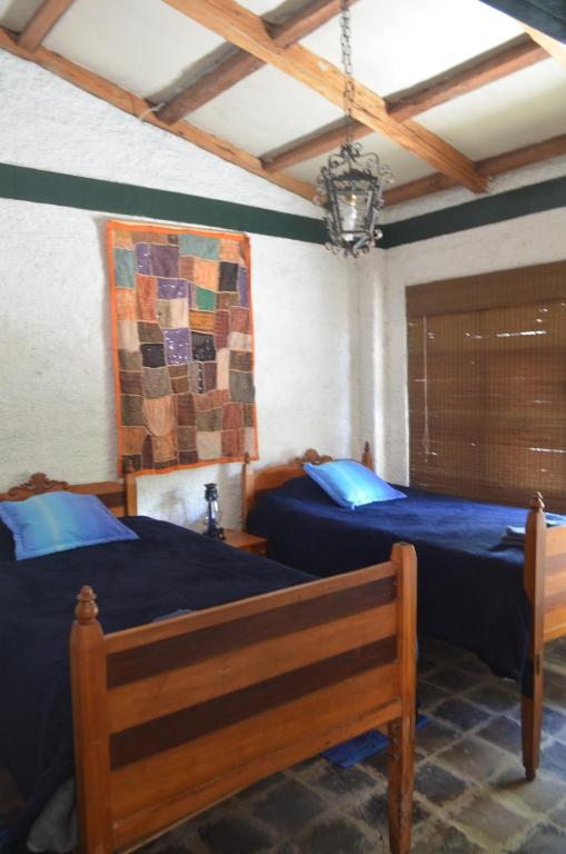 Postel nebo postele na pokoji v ubytování Hacienda Gonzabal