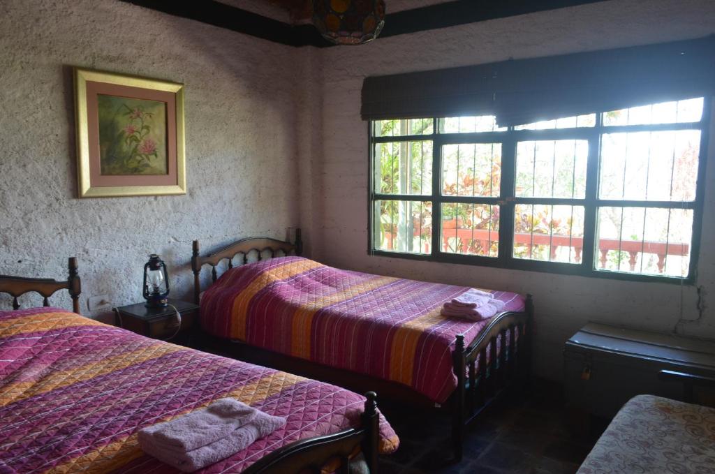 Postel nebo postele na pokoji v ubytování Hacienda Gonzabal