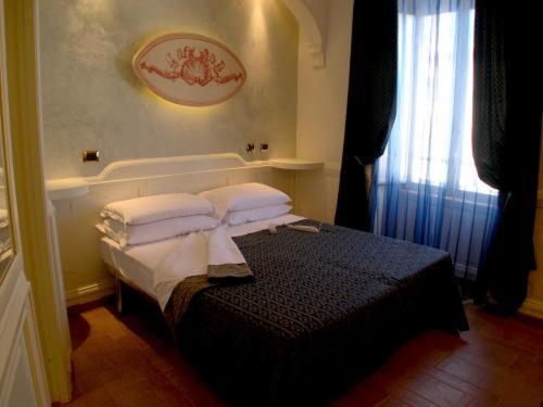Postel nebo postele na pokoji v ubytování Hotel Nardizzi Americana