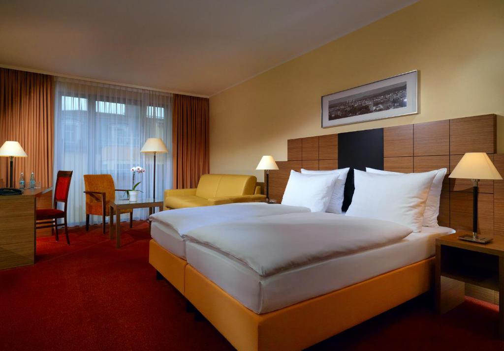 Postel nebo postele na pokoji v ubytování Best Western Hotel Bamberg