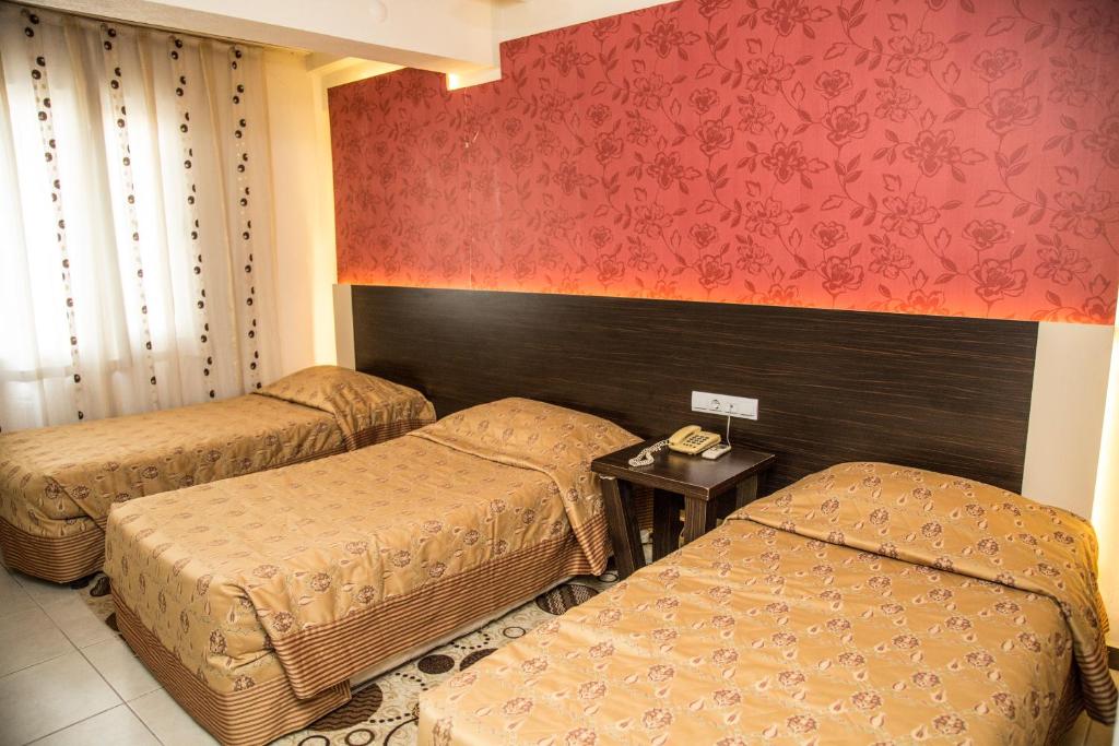 Postel nebo postele na pokoji v ubytování Reis Thermal Otel