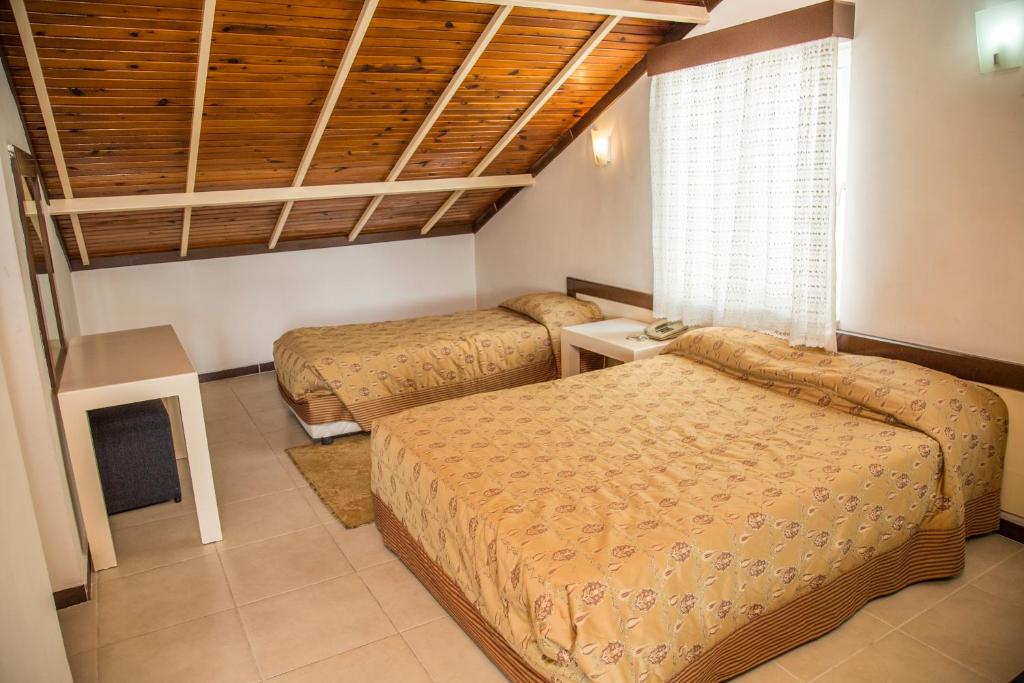 Postel nebo postele na pokoji v ubytování Reis Thermal Otel