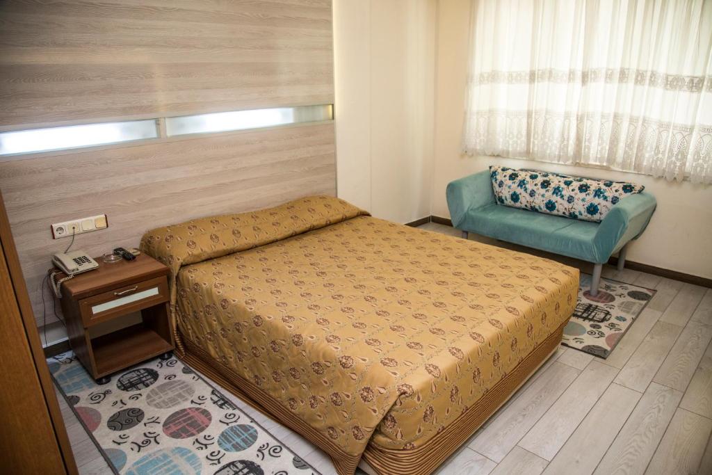 Postel nebo postele na pokoji v ubytování Reis Thermal Otel