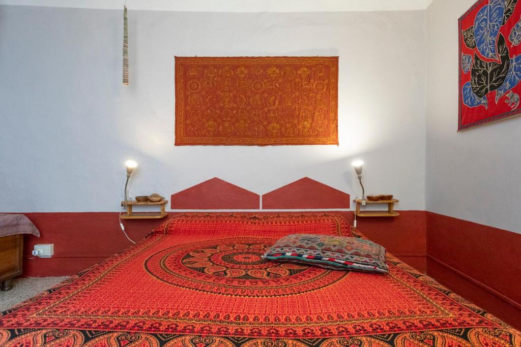 Postel nebo postele na pokoji v ubytování Le Cisterne B&B