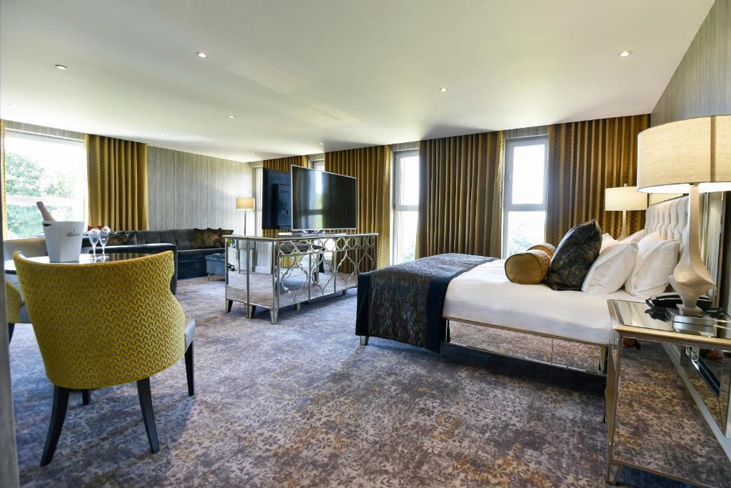 TV a/nebo společenská místnost v ubytování Hetland Hall Hotel