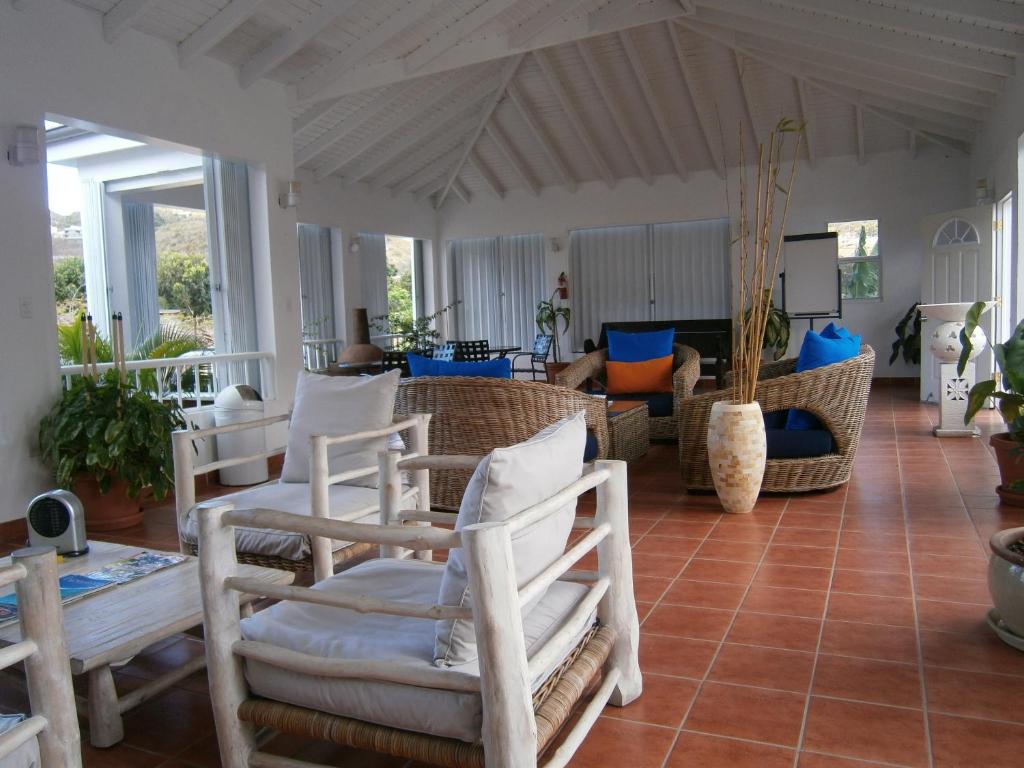 Posezení v ubytování L'Esperance Hotel