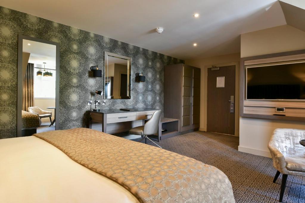 TV a/nebo společenská místnost v ubytování Hetland Hall Hotel