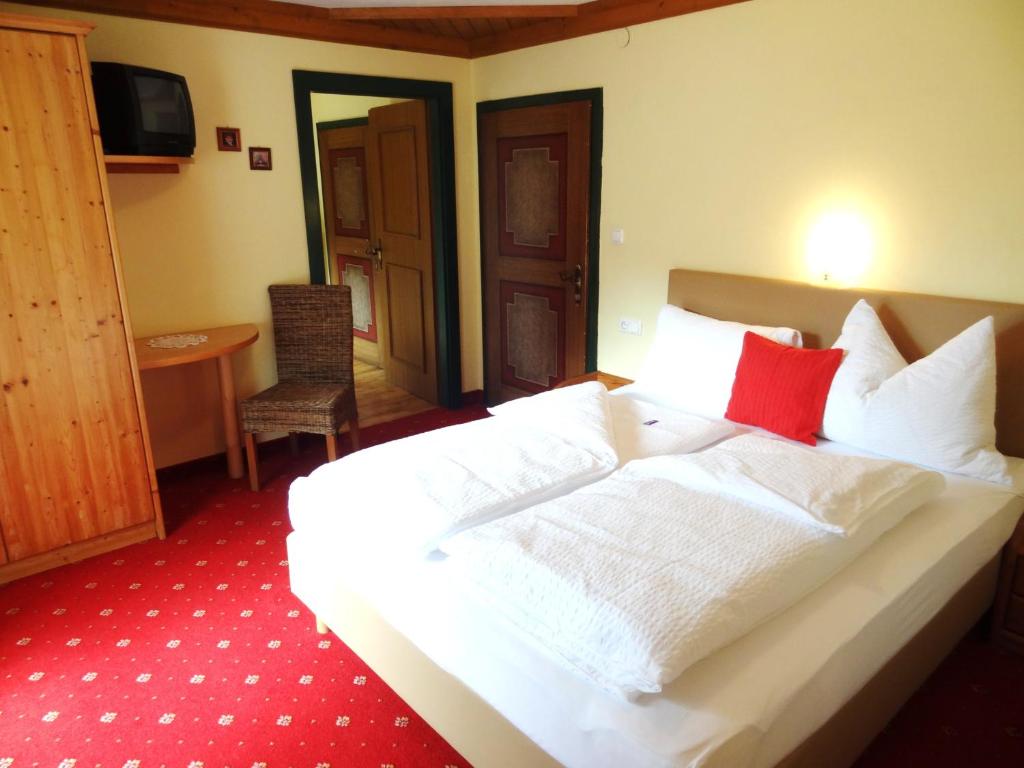 Postel nebo postele na pokoji v ubytování Pension Appartements Reithof