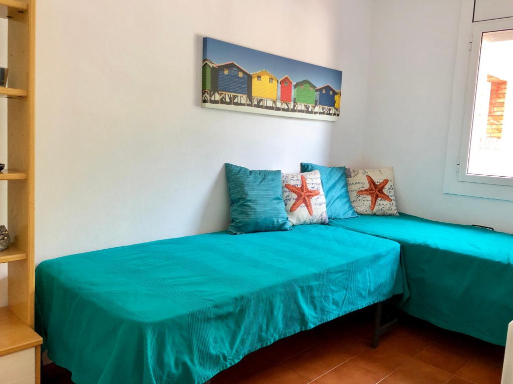 A bed or beds in a room at Musclera