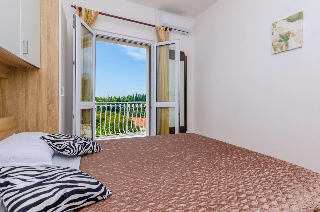 Posteľ alebo postele v izbe v ubytovaní Villa Dalmatian Gem