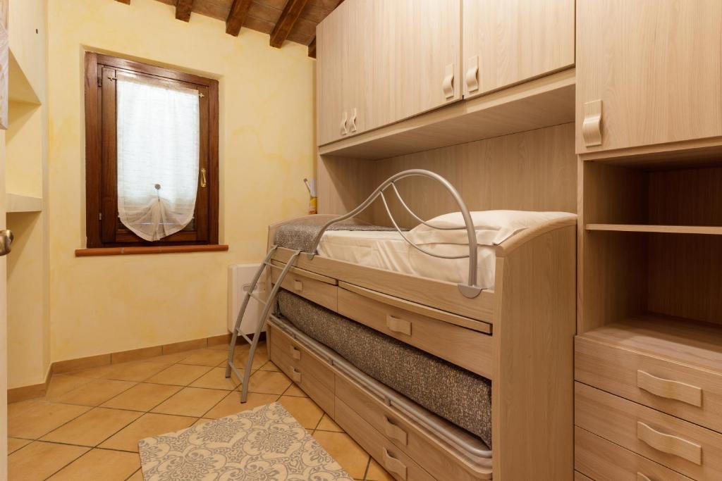 Postel nebo postele na pokoji v ubytování Borgo dei Gigli