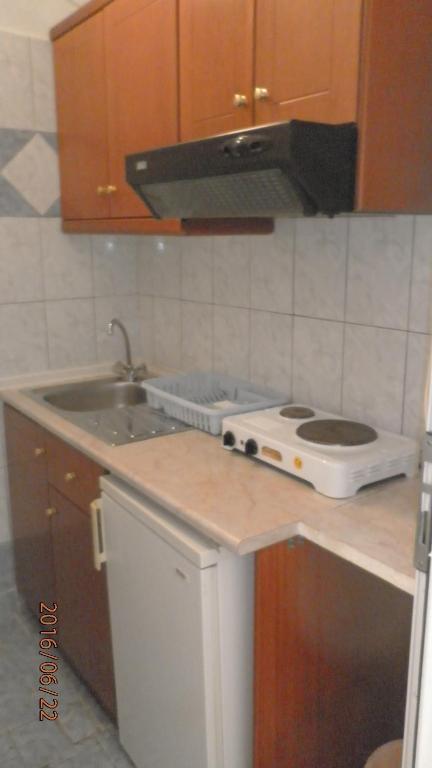 Kuchyň nebo kuchyňský kout v ubytování PLAZA Studios