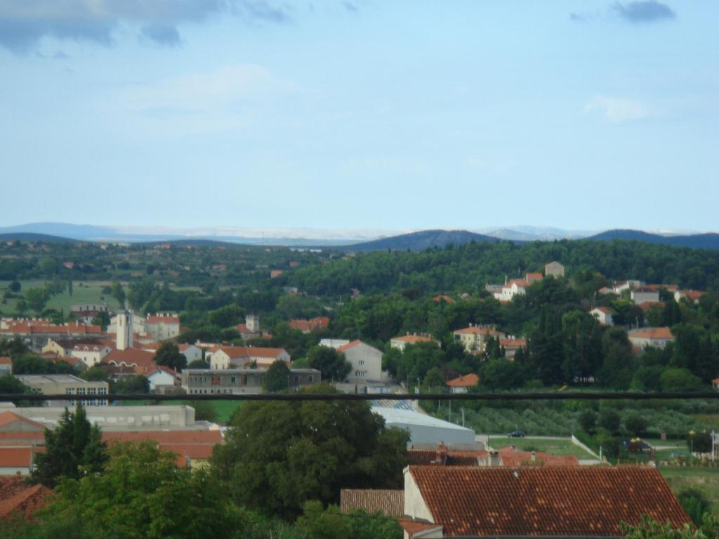 a view of a town with trees and buildings at Appartement Nicole BENKOVAC in Benkovac