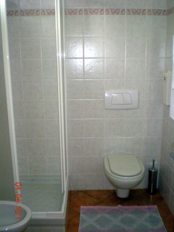 Koupelna v ubytování Hotel La Locanda