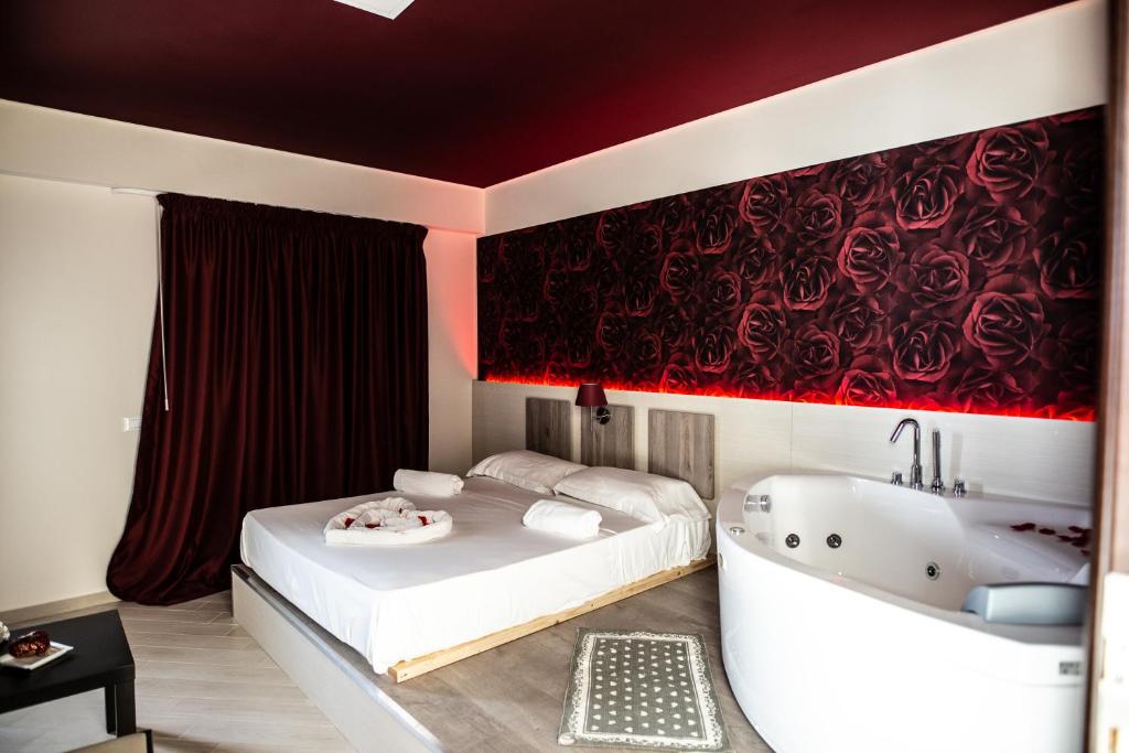 Postel nebo postele na pokoji v ubytování Hotel Cliché