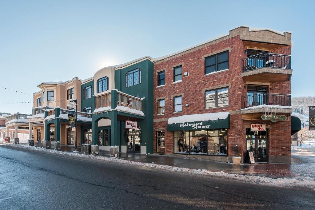 a brick building on the side of a street at Downtown 2 Bedroom Town Lift in Park City