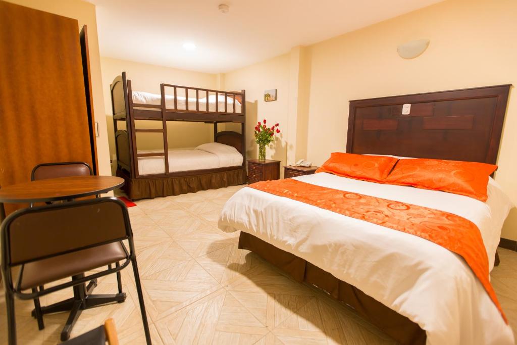 Postel nebo postele na pokoji v ubytování Hotel Saint Thomas