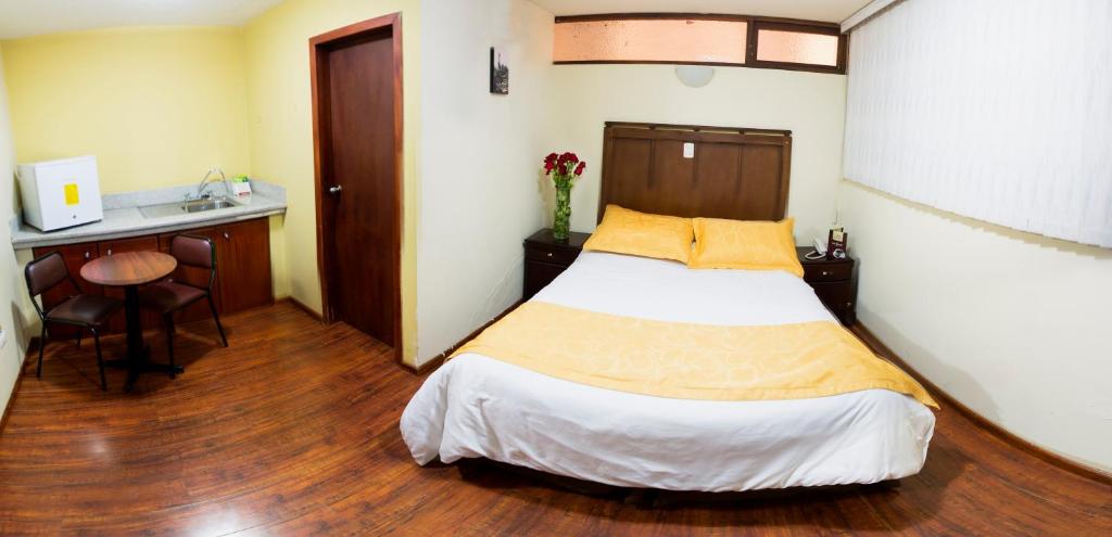 Postel nebo postele na pokoji v ubytování Hotel Saint Thomas