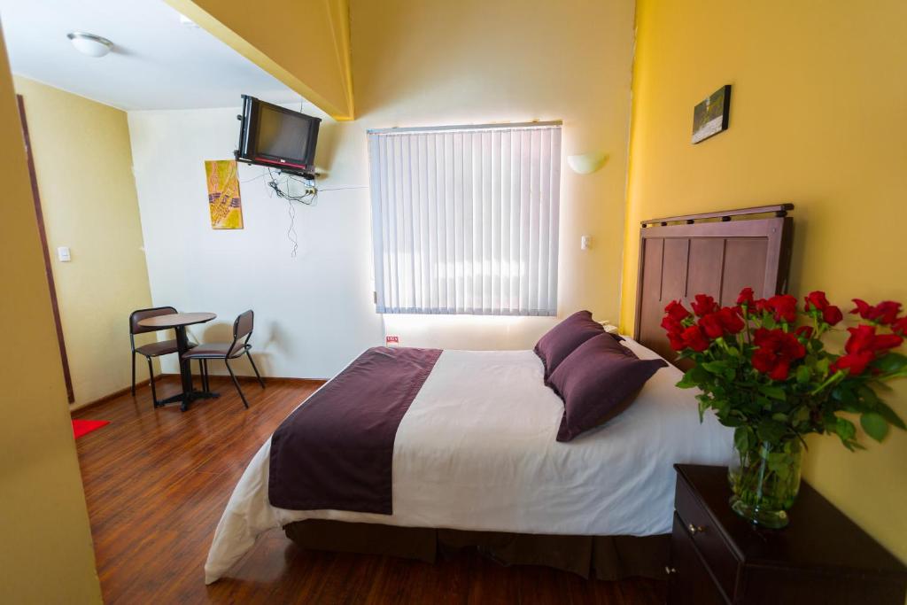 Postel nebo postele na pokoji v ubytování Hotel Saint Thomas