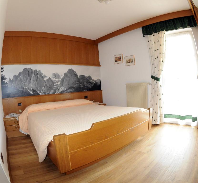 Postel nebo postele na pokoji v ubytování Hotel Garni Soreie