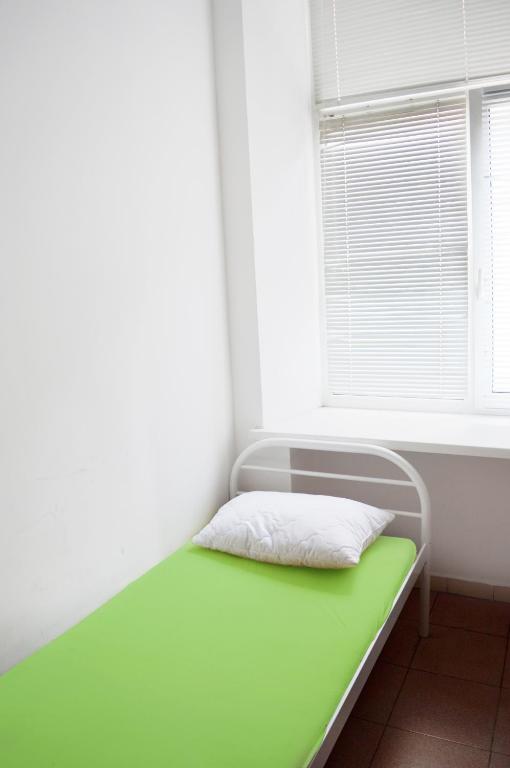 Postel nebo postele na pokoji v ubytování Hostel Vokzal