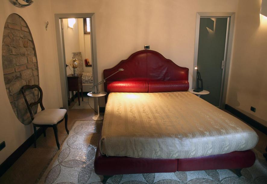 Postel nebo postele na pokoji v ubytování B&B Al Convento