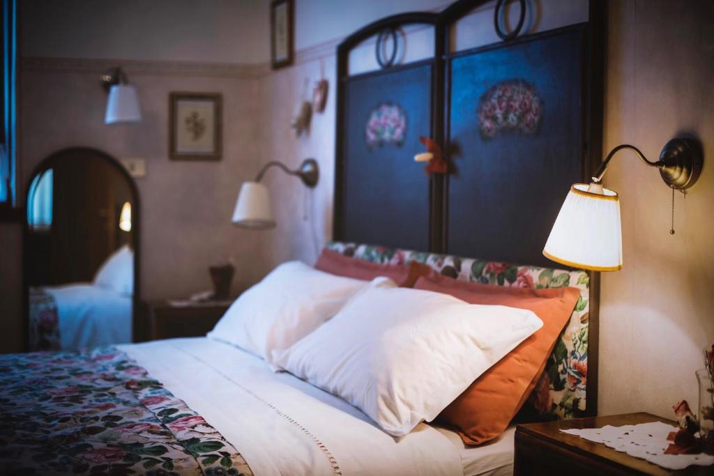מיטה או מיטות בחדר ב-Cà 'd Langa B&B