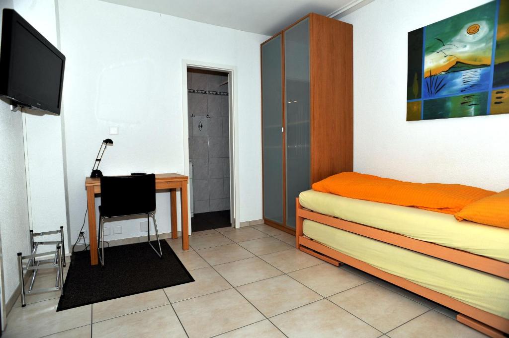 TV a/nebo společenská místnost v ubytování Niros Bed & Breakfast