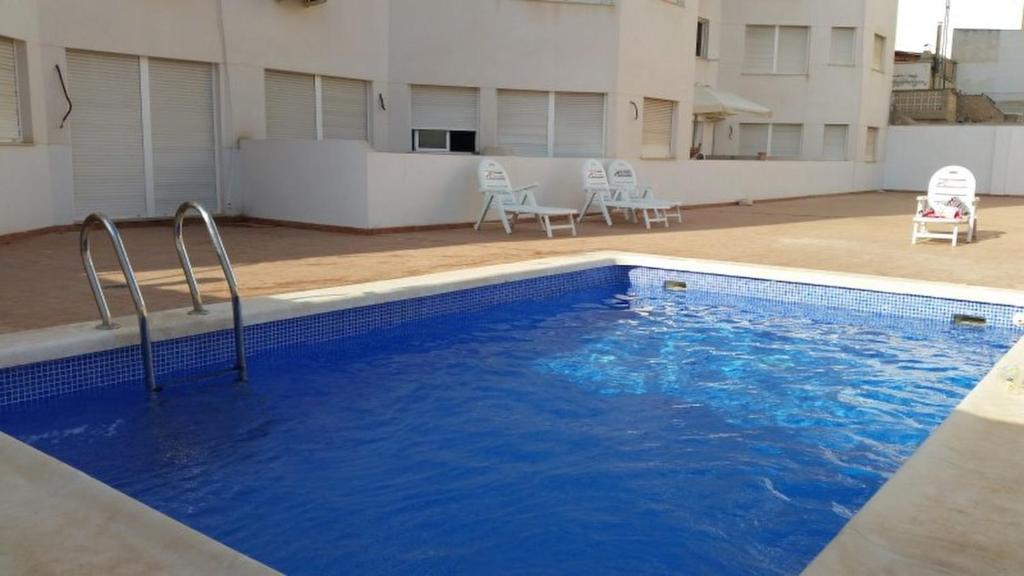 The swimming pool at or close to New apartment near center/beach