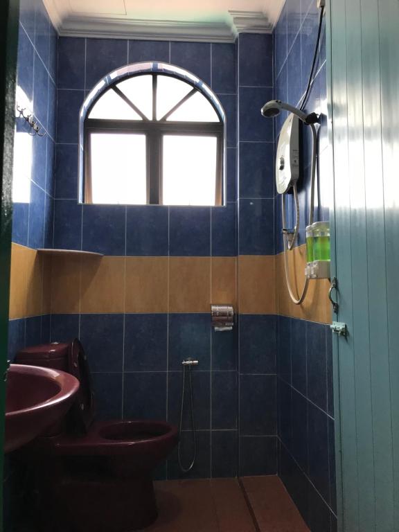 Koupelna v ubytování Kangsar Hotel