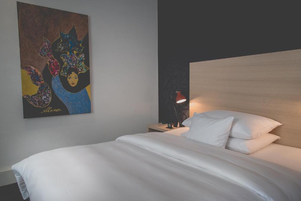Postel nebo postele na pokoji v ubytování Hotel Mon Repos
