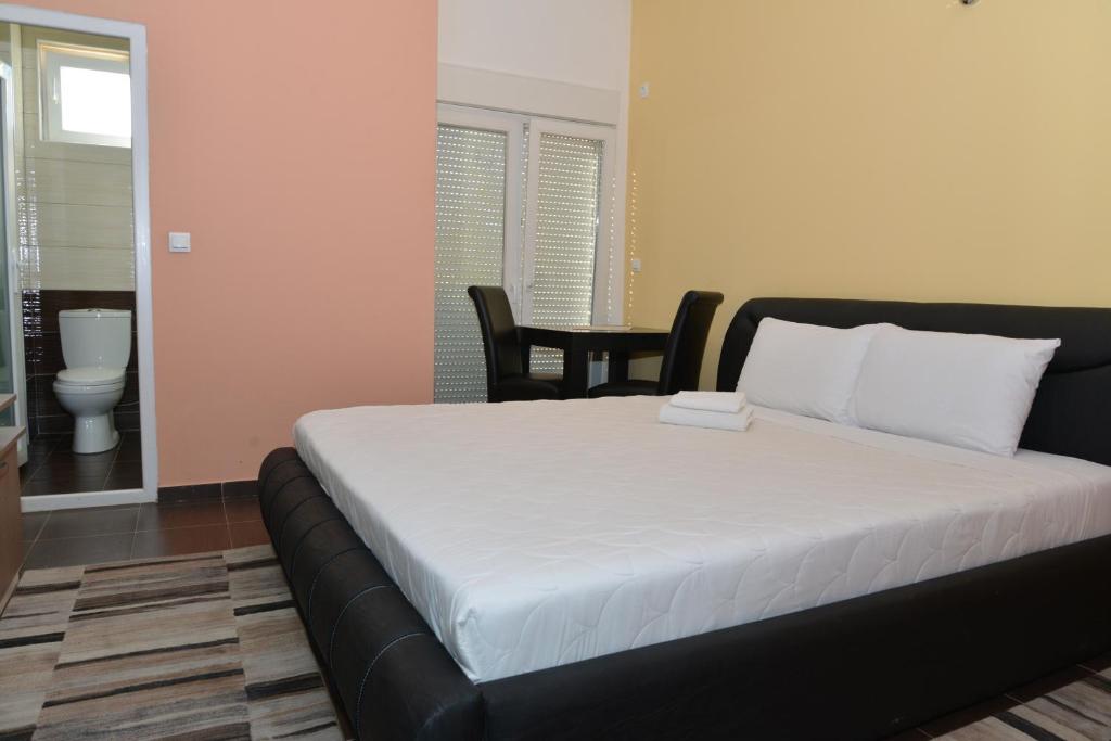 Postel nebo postele na pokoji v ubytování Hotel Konstantin