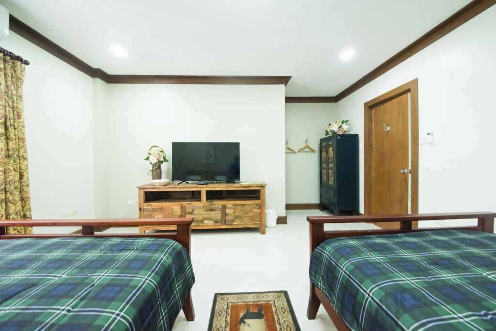 TV a/nebo společenská místnost v ubytování The Partridge Guesthouse