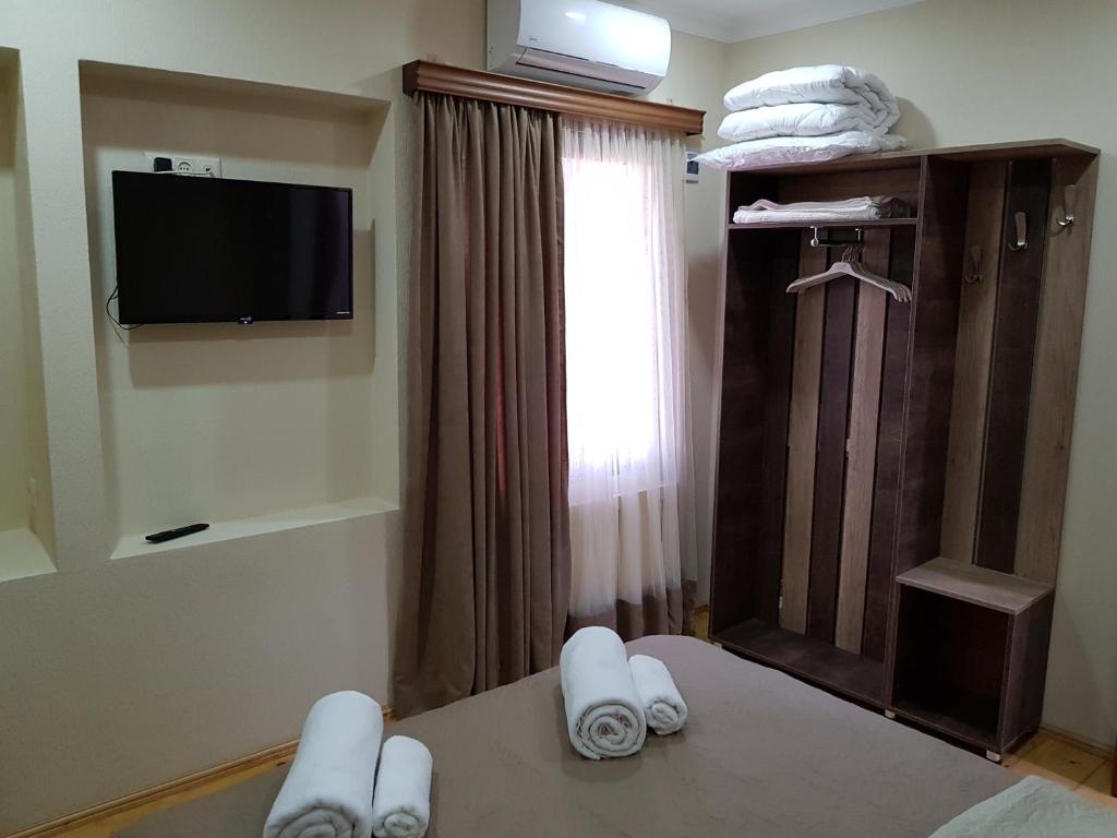 Postel nebo postele na pokoji v ubytování Hotel Villa