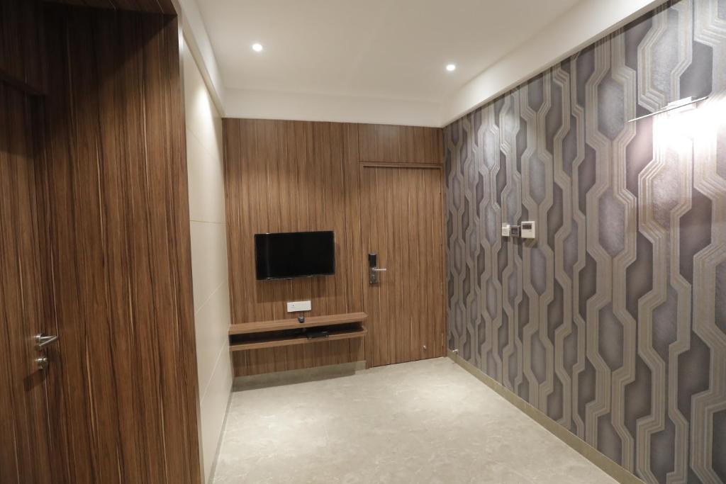 TV a/nebo společenská místnost v ubytování Hotel Radiance